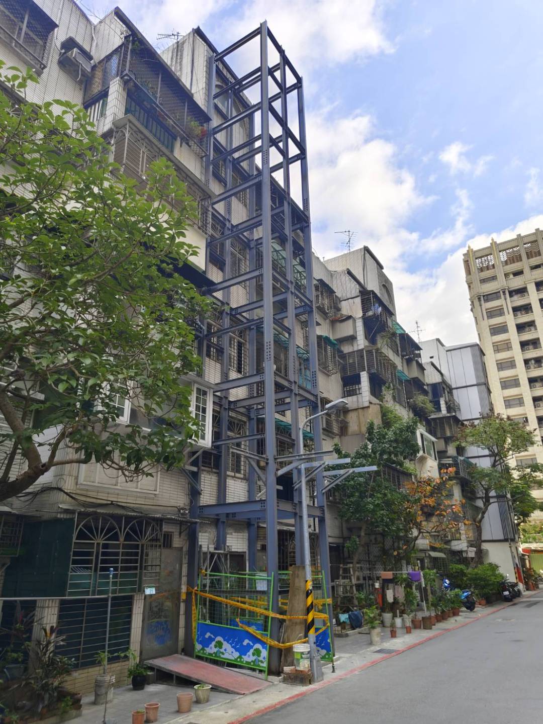  第五章｜老舊公寓增設電梯法規全攻略｜建築法、建照、使用執照、消防、無障礙一次看懂 第六章｜老舊公寓增設電梯費用全解析（2026最新版）｜工程成本、設計費、建照費、施工費一次看懂｜周嘉源建築師事務所 